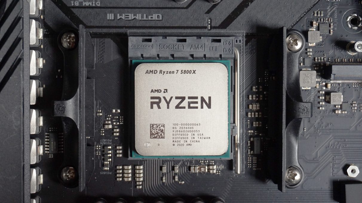 A photo of the AMD Ryzen 7 5800X seated in its motherboard socket.